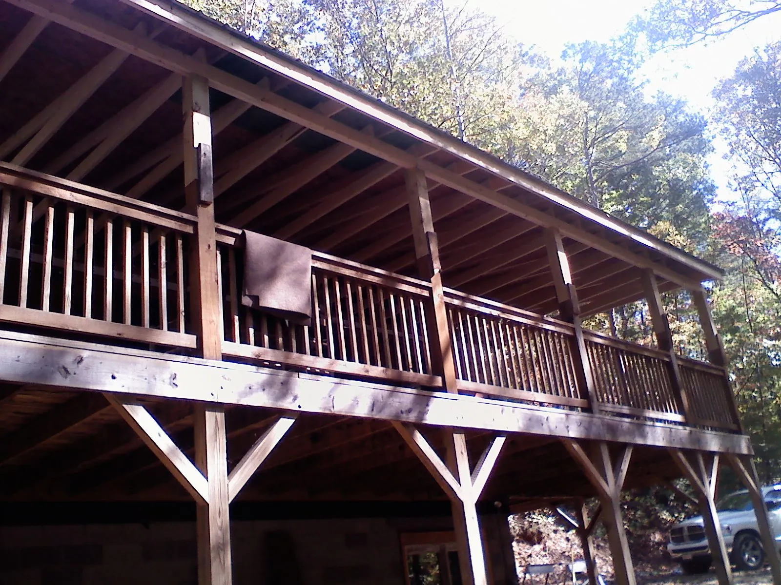 Timber framing under a new elevated porch and deck — Roof Leak Repair in Byrdstown by Roofing Brothers